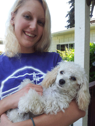 staff holding dog